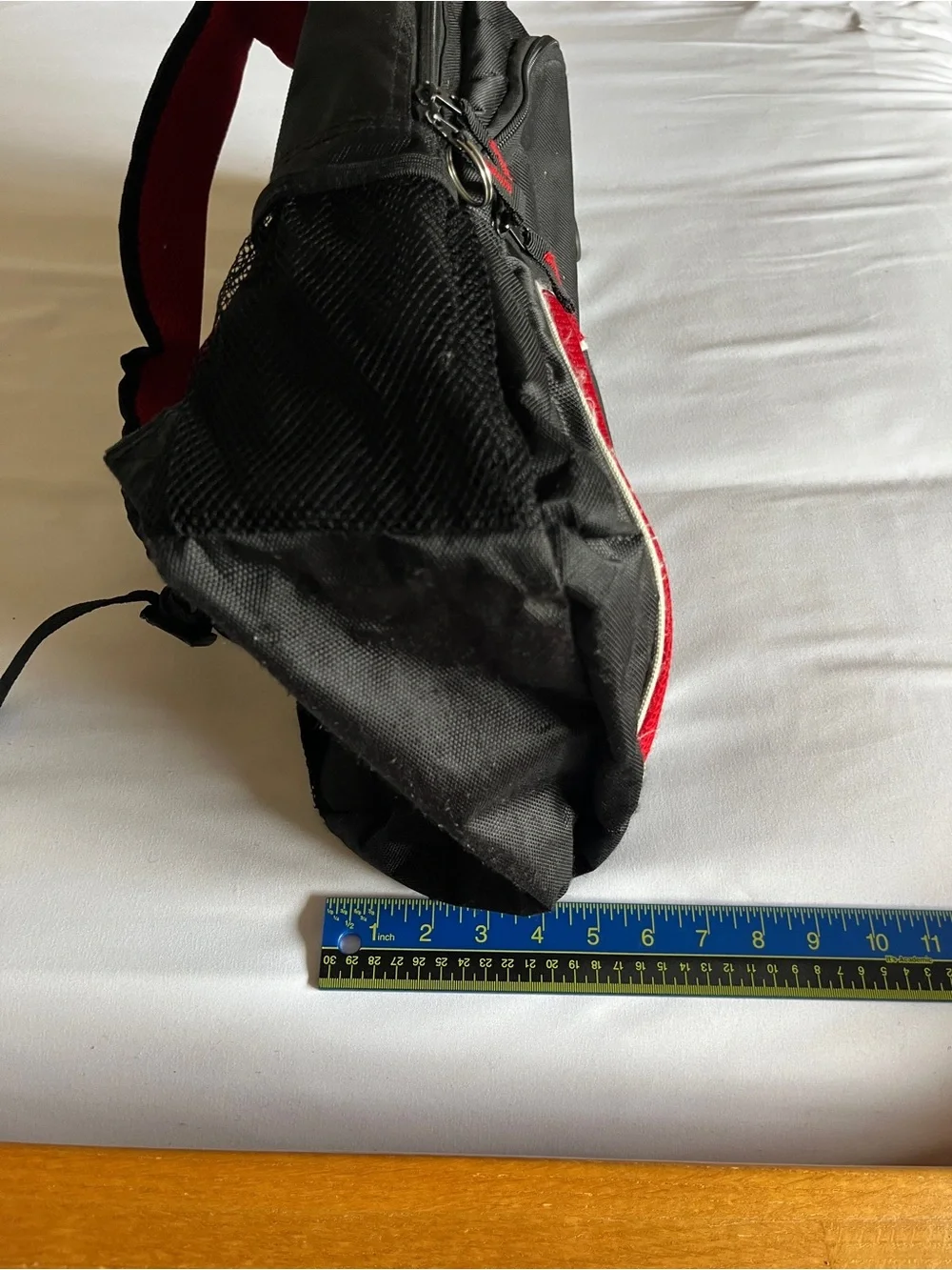 Black & Red Multi-Pocket Backpack with Media Port & Mesh Side Pockets